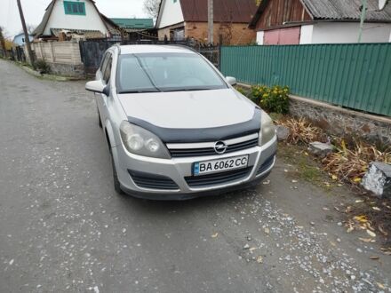 Серый Опель Астра, объемом двигателя 1.2 л и пробегом 300 тыс. км за 3300 $, фото 1 на Automoto.ua