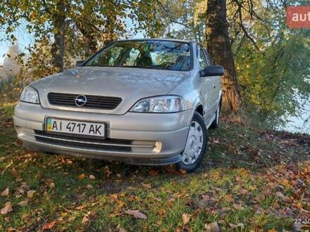Серый Опель Астра, объемом двигателя 1.4 л и пробегом 98 тыс. км за 5550 $, фото 1 на Automoto.ua