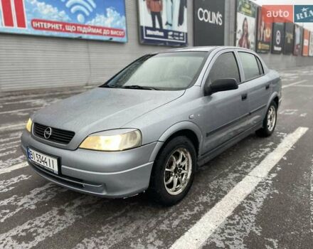 Серый Опель Астра, объемом двигателя 1.4 л и пробегом 250 тыс. км за 3200 $, фото 1 на Automoto.ua