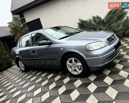 Серый Опель Астра, объемом двигателя 1.6 л и пробегом 141 тыс. км за 4950 $, фото 1 на Automoto.ua