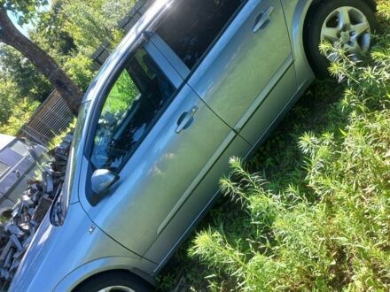 Серый Опель Астра, объемом двигателя 1.6 л и пробегом 255 тыс. км за 4500 $, фото 1 на Automoto.ua