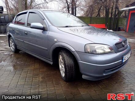 Серый Опель Астра, объемом двигателя 1.6 л и пробегом 270 тыс. км за 3400 $, фото 1 на Automoto.ua