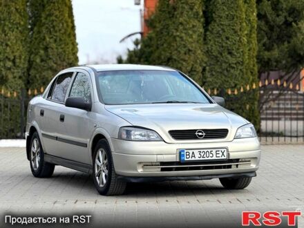 Серый Опель Астра, объемом двигателя 1.4 л и пробегом 298 тыс. км за 2999 $, фото 1 на Automoto.ua