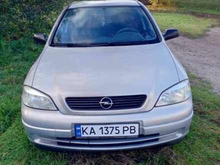 Серый Опель Астра, объемом двигателя 1.4 л и пробегом 300 тыс. км за 3500 $, фото 1 на Automoto.ua