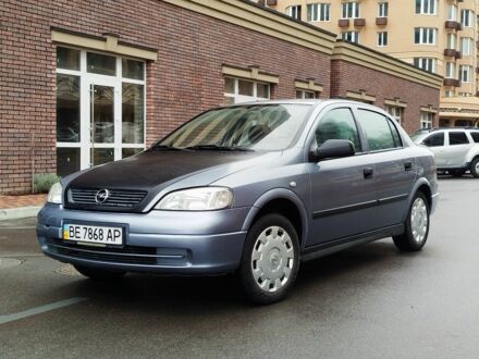 Серый Опель Астра, объемом двигателя 1.4 л и пробегом 136 тыс. км за 3000 $, фото 1 на Automoto.ua
