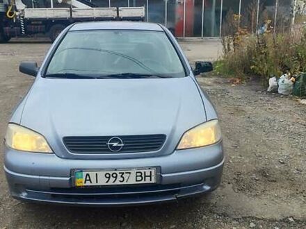 Серый Опель Астра, объемом двигателя 1.4 л и пробегом 250 тыс. км за 3000 $, фото 1 на Automoto.ua