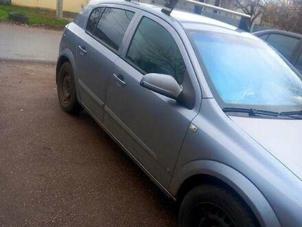 Серый Опель Астра, объемом двигателя 1.4 л и пробегом 250 тыс. км за 4600 $, фото 1 на Automoto.ua