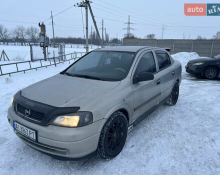 Серый Опель Астра, объемом двигателя 1.4 л и пробегом 300 тыс. км за 2150 $, фото 1 на Automoto.ua