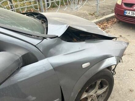 Серый Опель Астра, объемом двигателя 1.4 л и пробегом 410 тыс. км за 2000 $, фото 1 на Automoto.ua