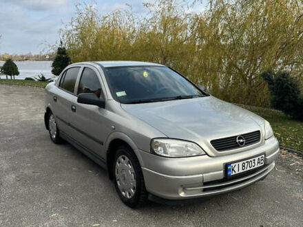 Серый Опель Астра, объемом двигателя 1.6 л и пробегом 242 тыс. км за 3700 $, фото 1 на Automoto.ua