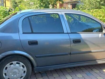 Серый Опель Астра, объемом двигателя 1.4 л и пробегом 169 тыс. км за 4400 $, фото 1 на Automoto.ua