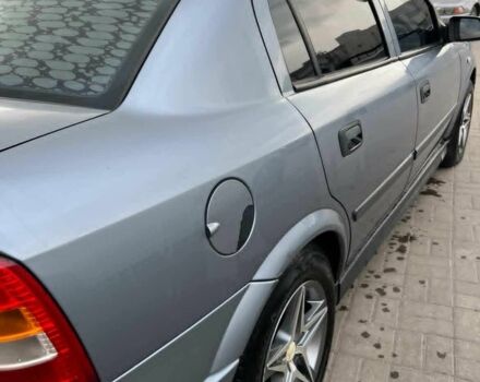 Серый Опель Астра, объемом двигателя 1.4 л и пробегом 243 тыс. км за 3400 $, фото 1 на Automoto.ua