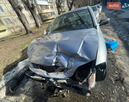 Серый Опель Астра, объемом двигателя 1.4 л и пробегом 176 тыс. км за 1500 $, фото 1 на Automoto.ua