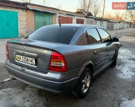 Серый Опель Астра, объемом двигателя 1.4 л и пробегом 180 тыс. км за 1750 $, фото 1 на Automoto.ua