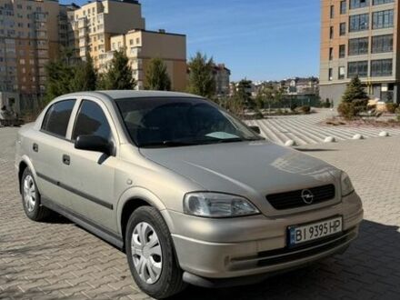 Серый Опель Астра, объемом двигателя 1.4 л и пробегом 220 тыс. км за 3500 $, фото 1 на Automoto.ua