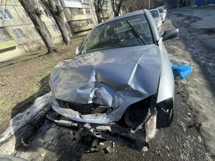 Серый Опель Астра, объемом двигателя 1.4 л и пробегом 176 тыс. км за 1500 $, фото 1 на Automoto.ua