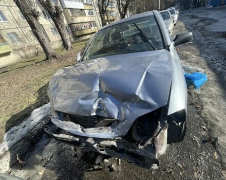 Серый Опель Астра, объемом двигателя 1.4 л и пробегом 176 тыс. км за 1500 $, фото 1 на Automoto.ua