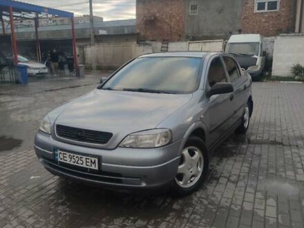 Серый Опель Астра, объемом двигателя 1.6 л и пробегом 298 тыс. км за 4200 $, фото 1 на Automoto.ua