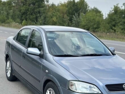 Серый Опель Астра, объемом двигателя 1.6 л и пробегом 230 тыс. км за 4300 $, фото 1 на Automoto.ua