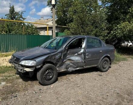 Серый Опель Астра, объемом двигателя 1.4 л и пробегом 122 тыс. км за 1500 $, фото 1 на Automoto.ua