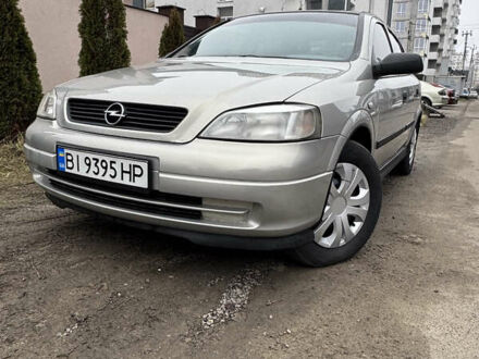 Серый Опель Астра, объемом двигателя 1.4 л и пробегом 218 тыс. км за 4000 $, фото 1 на Automoto.ua