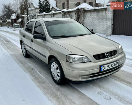 Серый Опель Астра, объемом двигателя 1.4 л и пробегом 220 тыс. км за 3750 $, фото 1 на Automoto.ua