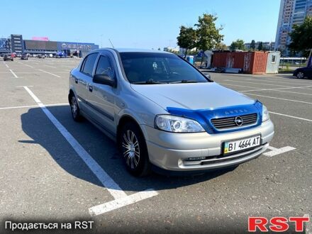 Серый Опель Астра, объемом двигателя 1.4 л и пробегом 154 тыс. км за 5400 $, фото 1 на Automoto.ua