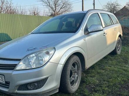 Серый Опель Астра, объемом двигателя 1.69 л и пробегом 240 тыс. км за 4850 $, фото 1 на Automoto.ua