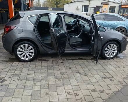 Серый Опель Астра, объемом двигателя 2 л и пробегом 230 тыс. км за 7200 $, фото 1 на Automoto.ua