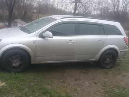 Серый Опель Астра, объемом двигателя 1.4 л и пробегом 220 тыс. км за 5200 $, фото 1 на Automoto.ua