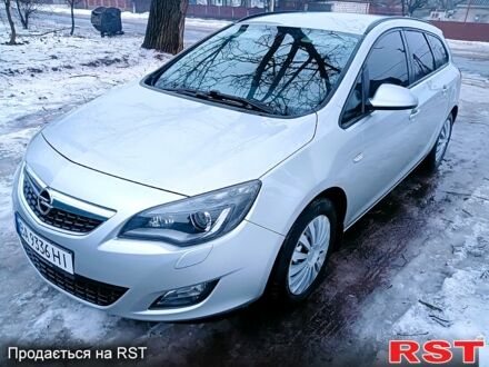 Серый Опель Астра, объемом двигателя 1.2 л и пробегом 28800 тыс. км за 5200 $, фото 1 на Automoto.ua