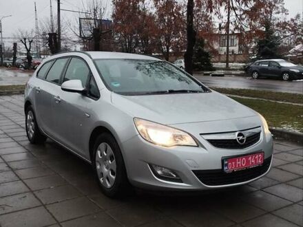 Серый Опель Астра, объемом двигателя 1.3 л и пробегом 236 тыс. км за 6950 $, фото 1 на Automoto.ua
