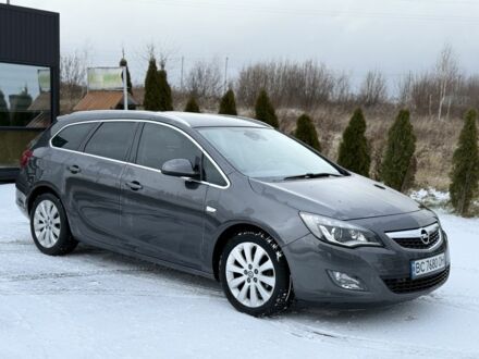 Серый Опель Астра, объемом двигателя 1.2 л и пробегом 318 тыс. км за 5999 $, фото 1 на Automoto.ua