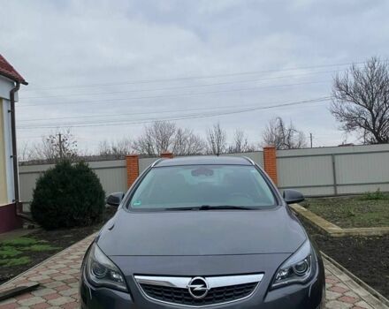 Серый Опель Астра, объемом двигателя 2 л и пробегом 245 тыс. км за 8850 $, фото 1 на Automoto.ua