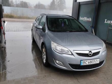 Серый Опель Астра, объемом двигателя 1.2 л и пробегом 254 тыс. км за 5000 $, фото 1 на Automoto.ua