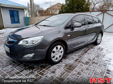 Серый Опель Астра, объемом двигателя 1.2 л и пробегом 220 тыс. км за 5999 $, фото 1 на Automoto.ua