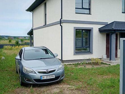 Серый Опель Астра, объемом двигателя 1.25 л и пробегом 300 тыс. км за 4200 $, фото 1 на Automoto.ua