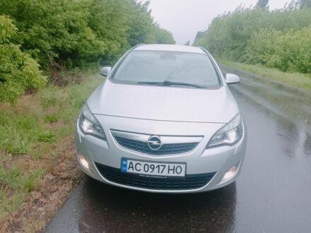 Серый Опель Астра, объемом двигателя 1.2 л и пробегом 266 тыс. км за 5550 $, фото 1 на Automoto.ua