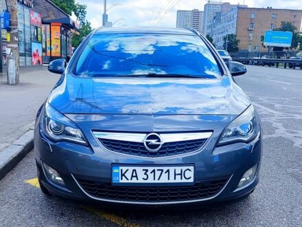 Серый Опель Астра, объемом двигателя 2 л и пробегом 250 тыс. км за 8800 $, фото 1 на Automoto.ua