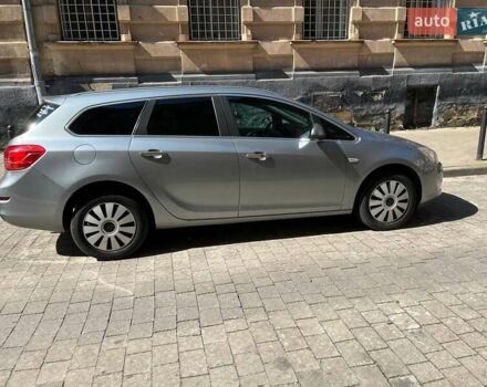 Серый Опель Астра, объемом двигателя 1.25 л и пробегом 247 тыс. км за 8400 $, фото 1 на Automoto.ua