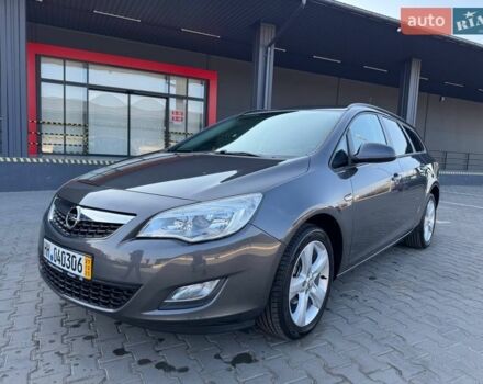 Серый Опель Астра, объемом двигателя 1.4 л и пробегом 86 тыс. км за 8600 $, фото 1 на Automoto.ua