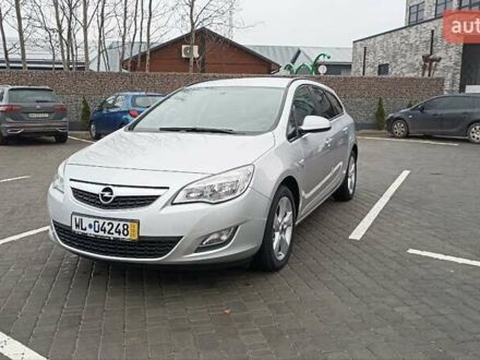 Серый Опель Астра, объемом двигателя 1.4 л и пробегом 128 тыс. км за 8650 $, фото 1 на Automoto.ua