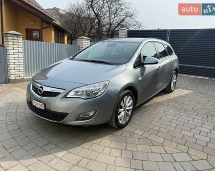 Серый Опель Астра, объемом двигателя 1.4 л и пробегом 153 тыс. км за 7499 $, фото 1 на Automoto.ua