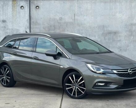 Серый Опель Астра, объемом двигателя 1.4 л и пробегом 39 тыс. км за 12450 $, фото 1 на Automoto.ua