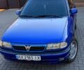 Синій Опель Астра, об'ємом двигуна 2 л та пробігом 350 тис. км за 3500 $, фото 6 на Automoto.ua