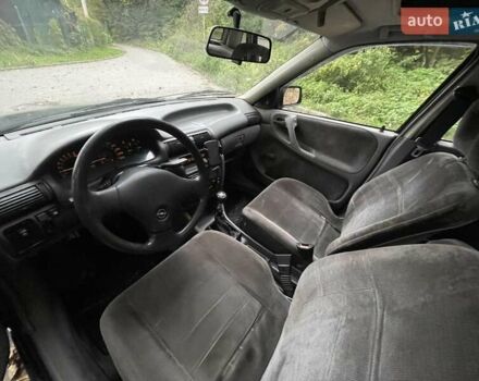 Синий Опель Астра, объемом двигателя 1.6 л и пробегом 300 тыс. км за 1500 $, фото 18 на Automoto.ua