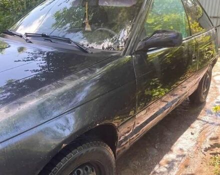 Синий Опель Астра, объемом двигателя 1.7 л и пробегом 350 тыс. км за 700 $, фото 2 на Automoto.ua