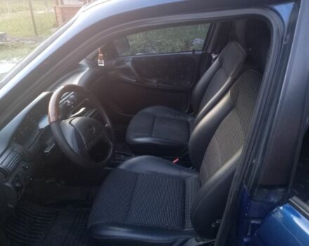 Синий Опель Астра, объемом двигателя 1.4 л и пробегом 400 тыс. км за 1100 $, фото 5 на Automoto.ua