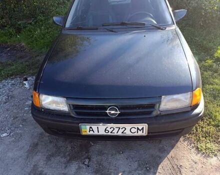 Синий Опель Астра, объемом двигателя 1.4 л и пробегом 404 тыс. км за 1500 $, фото 4 на Automoto.ua