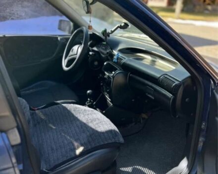 Синий Опель Астра, объемом двигателя 1.4 л и пробегом 400 тыс. км за 1600 $, фото 5 на Automoto.ua